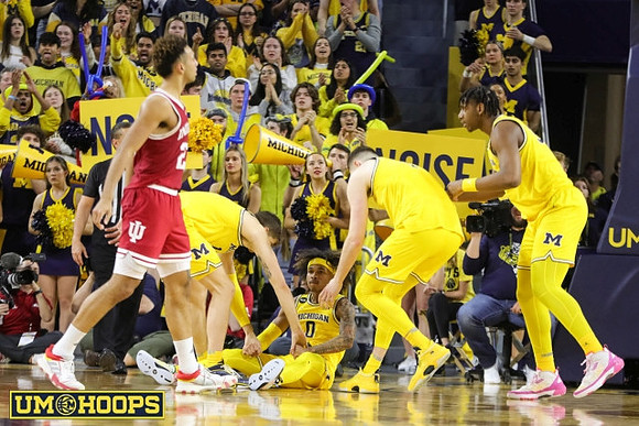 Joey Baker (15), Dug McDaniel (0), Hunter Dickinson (1), and Tarris Reed Jr. (32)