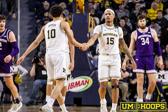 Justin Pippen (10) and Rubin Jones (15)