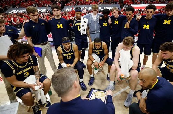Dusty May and Michigan Team