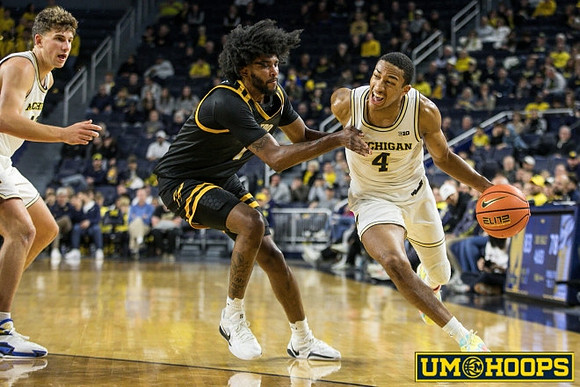 Will Tschetter (42) and Nimari Burnett (4)