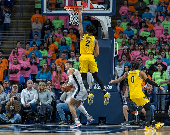 Kobe Bufkin (2) and Dug McDaniel (0)
