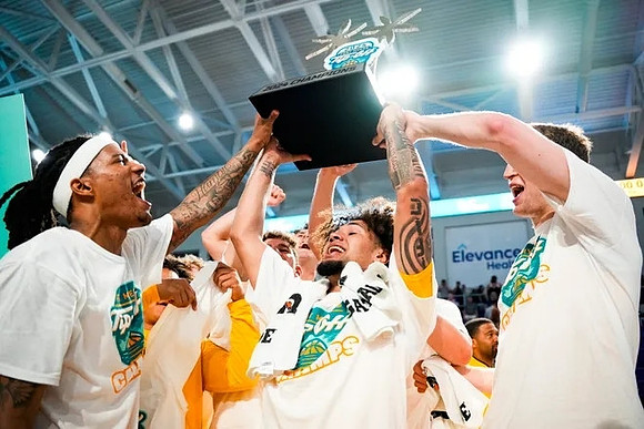 Michigan Team and Fort Myers Tip-Off Championship Trophy