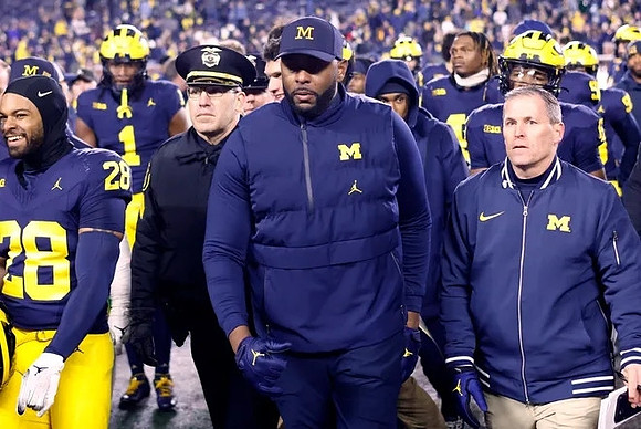 Sherrone Moore and Michigan Team