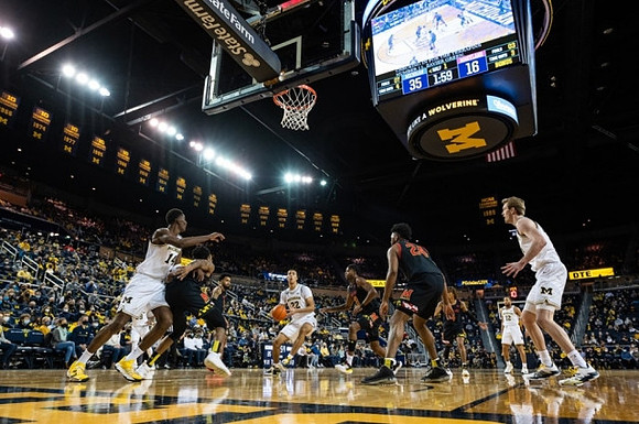 Moussa Diabate (14), Caleb Houstan (22), DeVante' Jones (12), and Jaron Faulds (44)