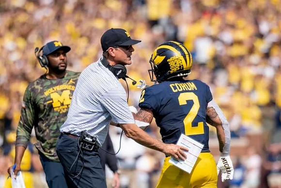 Jim Harbaugh and Blake Corum (2)