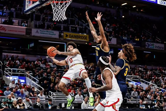 Roddy Gayle Jr. (11) and Tre Donaldson (3)
