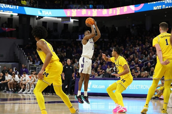 Kobe Bufkin (2), Jett Howard (13), and Hunter Dickinson (1)