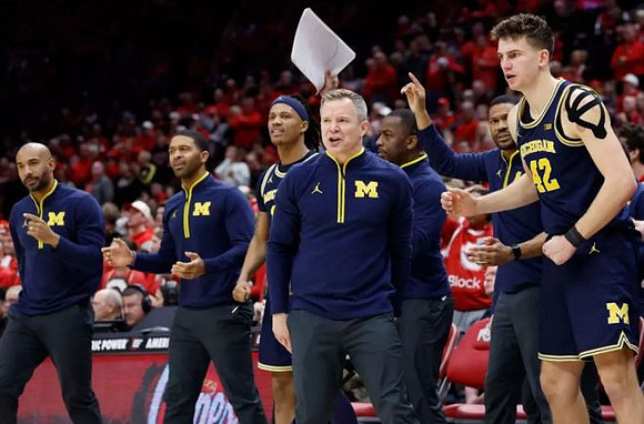 Dusty May and Michigan Team