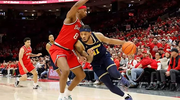 Roddy Gayle Jr. (11) and Nimari Burnett (4)