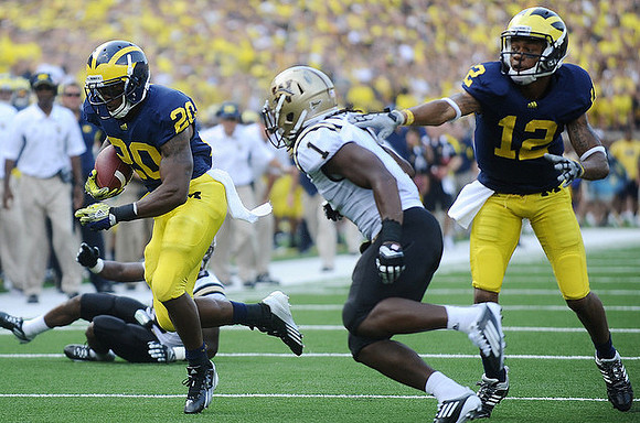 Michael Shaw (20) and Roy Roundtree (12)