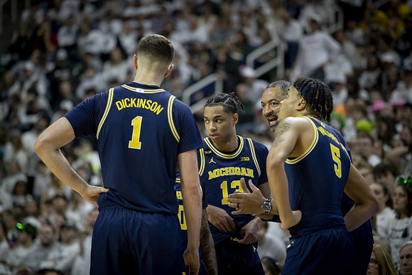 Hunter Dickinson (1), Jett Howard (13), Juwan Howard, and Terrance Williams II (5)