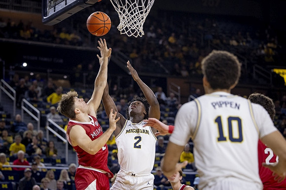 L.J. Cason (2) and Justin Pippen (10)