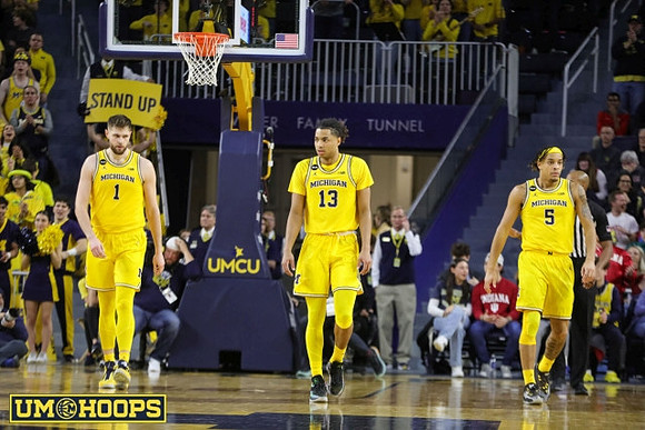 Hunter Dickinson (1), Jett Howard (13), and Terrance Williams II (5)