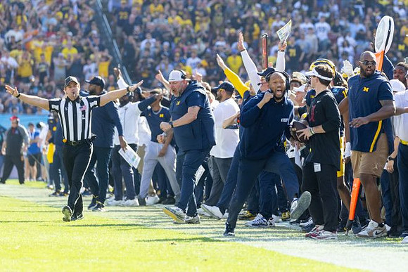 Sherrone Moore and Michigan Team