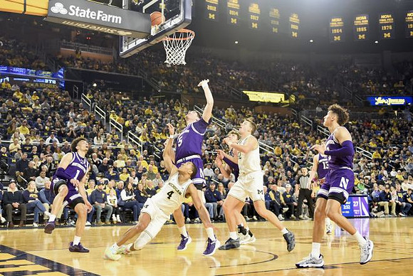 Nimari Burnett (4) and Will Tschetter (42)