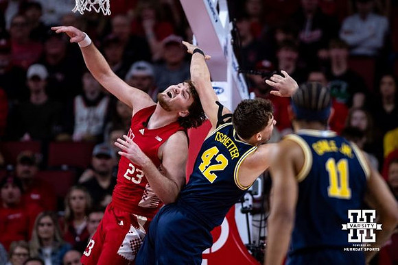 Will Tschetter (42) and Roddy Gayle Jr. (11)