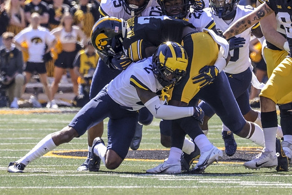 Will Johnson (2) and Kalel Mullings (20)