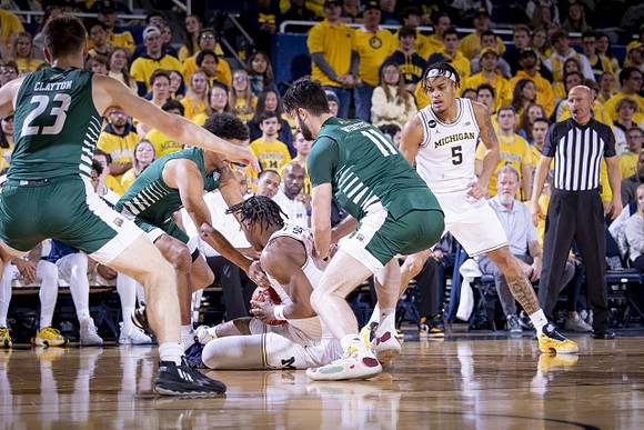 Tarris Reed Jr. (32) and Terrance Williams II (5)