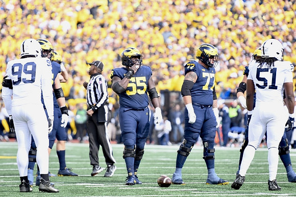 Olusegun Oluwatimi (55) and Trevor Keegan (77)