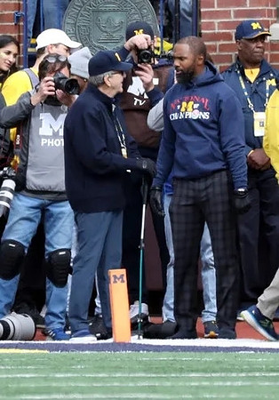 Lloyd Carr and Charles Woodson