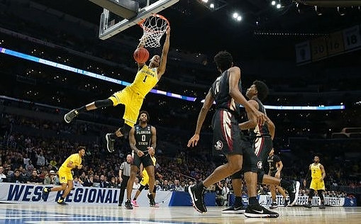 Charles Matthews (1), Isaiah Livers (4), and Zavier Simpson (3)
