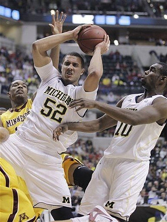 Jordan Morgan (52) and Tim Hardaway Jr. (10)