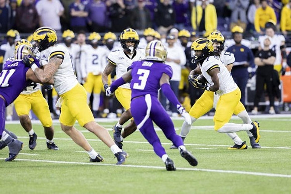 Jack Tuttle (13) and Donovan Edwards (7)