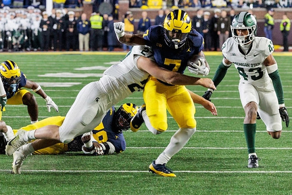 Myles Hinton (78) and Donovan Edwards (7)