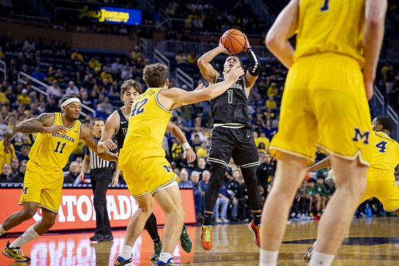 Roddy Gayle Jr. (11), Will Tschetter (42), Danny Wolf (1), and Nimari Burnett (4)