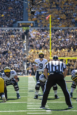 Zak Zinter (65), Olusegun Oluwatimi (55), J.J. McCarthy (9), and Trevor Keegan (77)