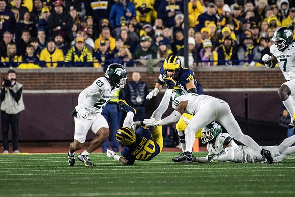 Kalel Mullings (20) and Andrew Gentry (75)