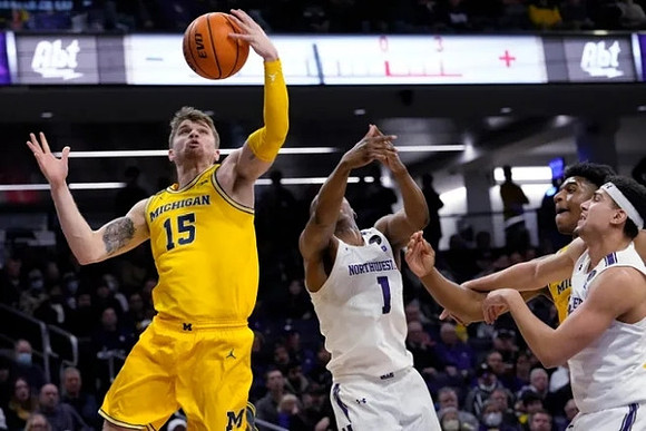 Joey Baker (15) and Tarris Reed Jr. (32)
