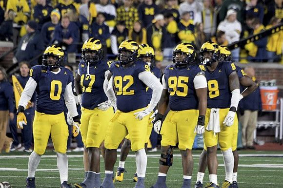 Josaiah Stewart (0), Enow Etta (17), Ike Iwunnah (92), Trey Pierce (95), and Derrick Moore (8)
