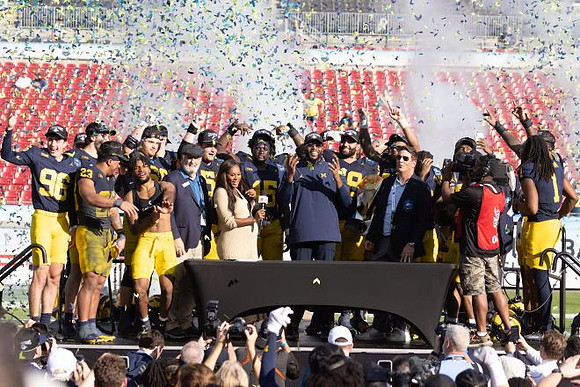 Sherrone Moore and Michigan Team