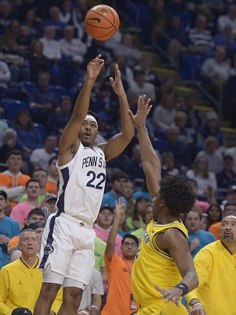 Tarris Reed Jr. (32) and Juwan Howard