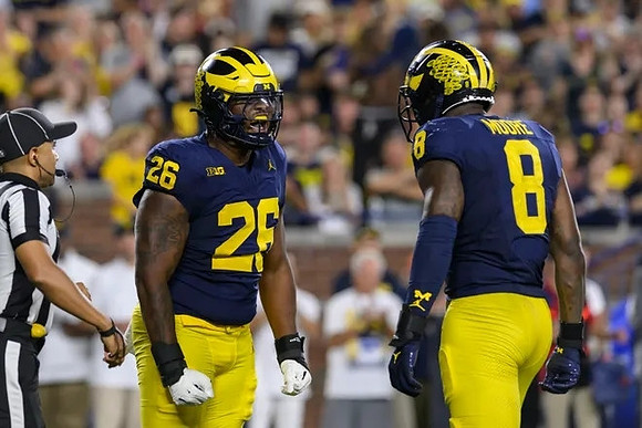 Rayshaun Benny (26) and Derrick Moore (8)
